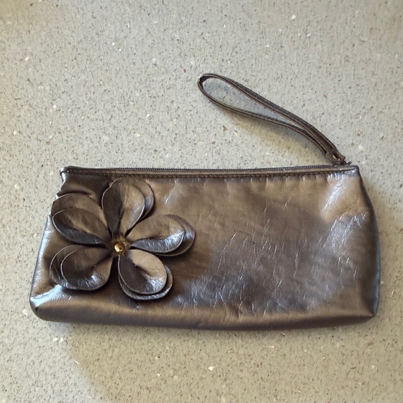 Sephora Handbags - Sephora Silver Wristlet with Floral Detail